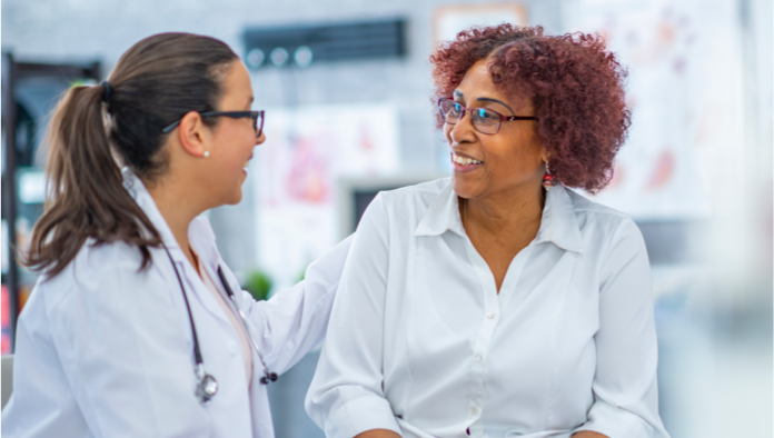 Female doctor talking to female patient| BCBS of Tennessee