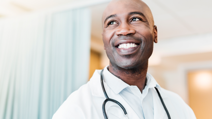  Young male doctor with white coat and stethoscope | BCBS of Tennessee